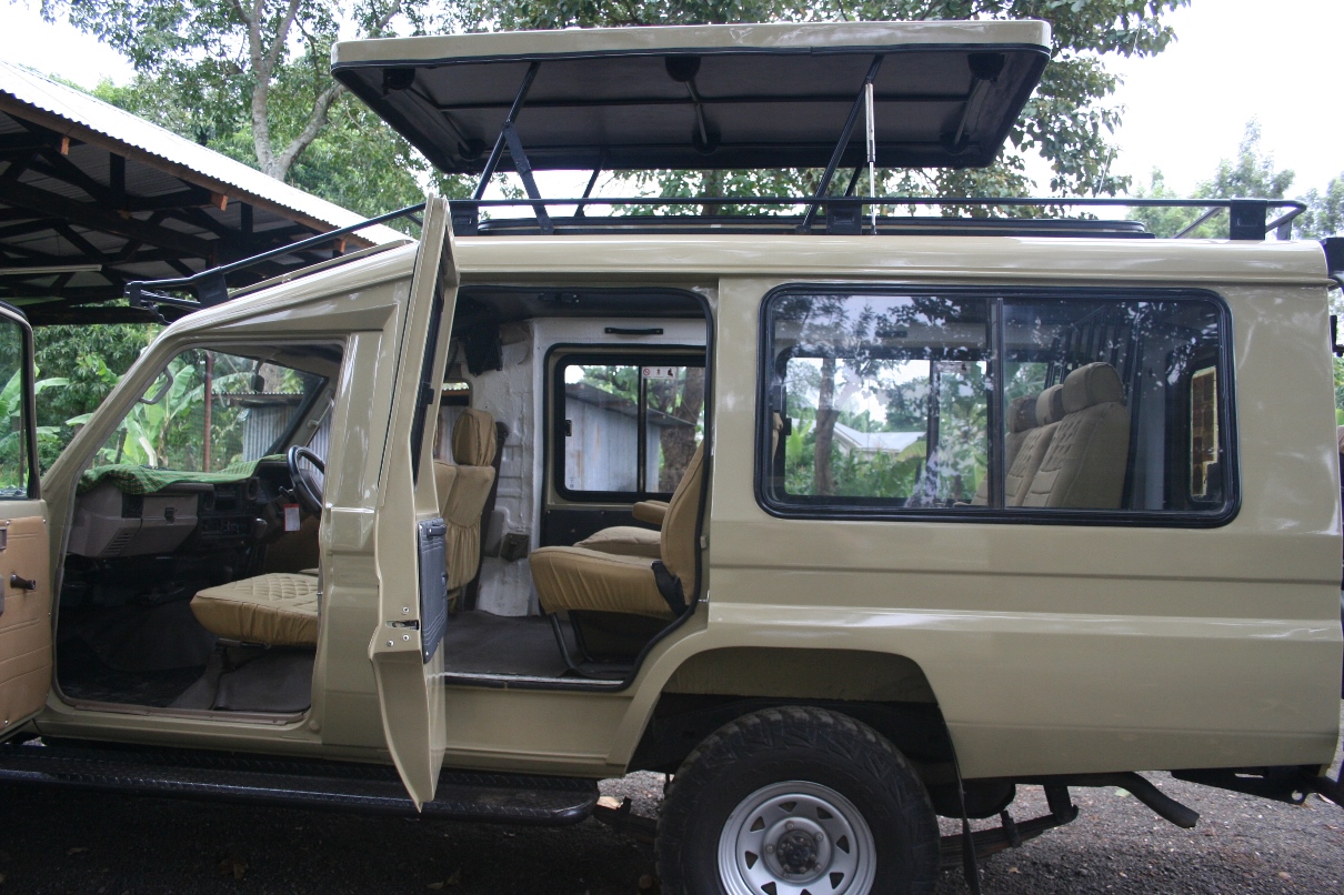Long base Land-cruiser with open canopy